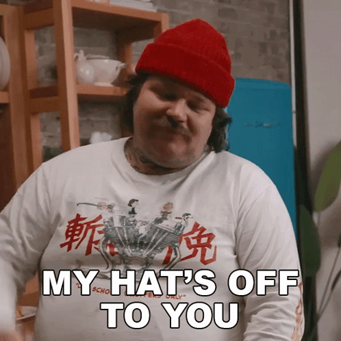 Man In Red Hat Shirt Says My Hat's Off To You GIF
