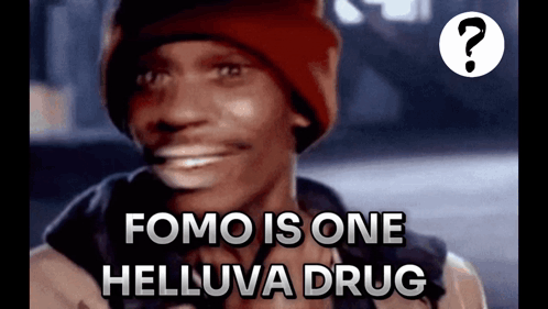 Man in Red Hat Smiling Fomo Is a Drug