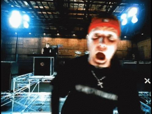 Man In Red Headband And Black Eminem Shirt GIF
