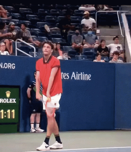Man in Red Holding Tennis Racquet Rolex Court