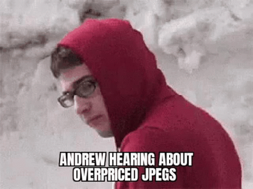 Man In Red Hoodie Glasses Hearing About Overpriced Jpegs GIF