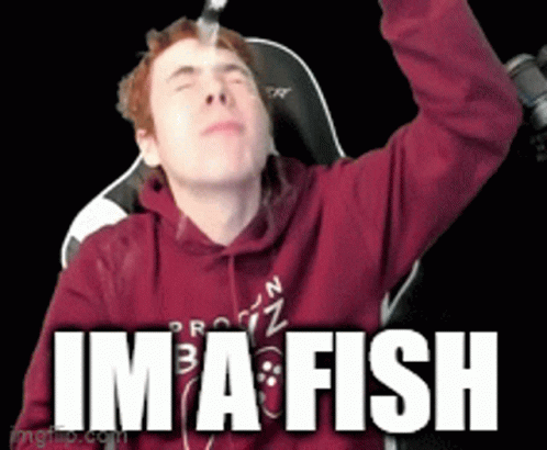 Man in Red Hoodie Holding Fork Saying I'm a Fish