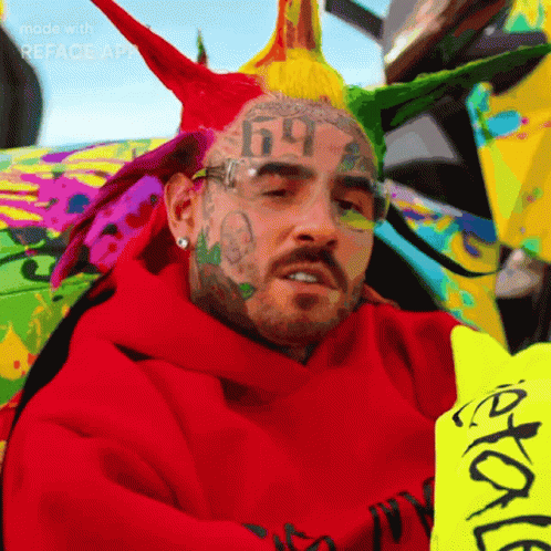 Man In Red Hoodie With Face Tattoo 99 GIF