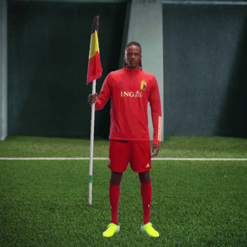 Man in Red Ing Jersey on Soccer Field
