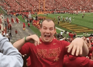 Man in Red Iowa State Cyclones Shirt at Football Field