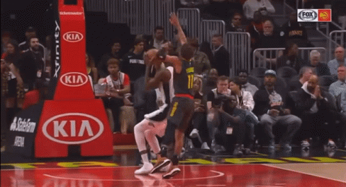 Man in Red Iron Man Suit Walking Down Stairs