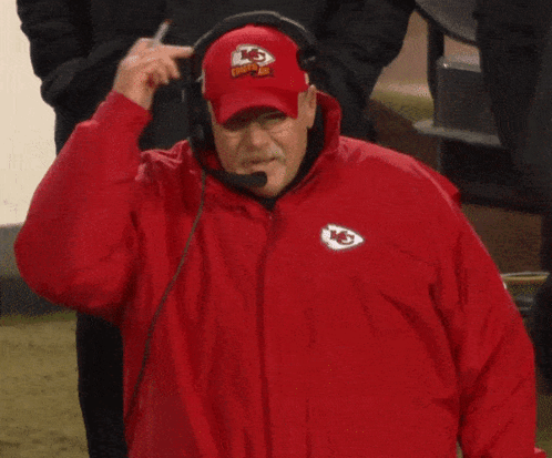 Man in Red Jacket and Chiefs Hat