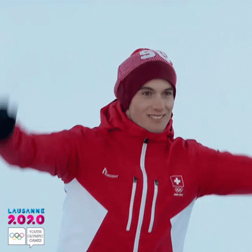 Man in Red Jacket and Red Beanie With Number 50
