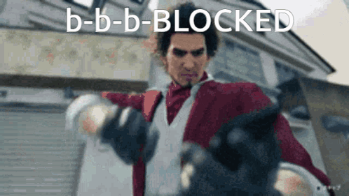 Man in Red Jacket and White Vest Holding Gun in Front of Building