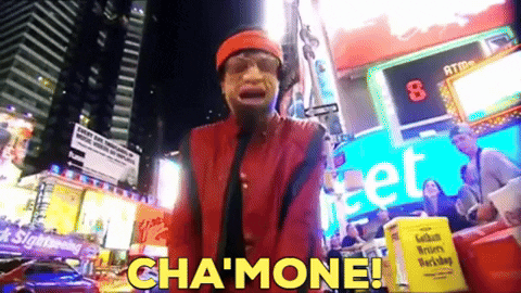 Man in Red Jacket Before Cha Mone Sign