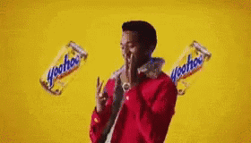 Man in Red Jacket Dancing with Soda