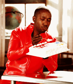 Man In Red Jacket Eating Cake GIF