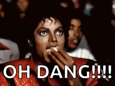 Man In Red Jacket Eating Popcorn Says Oh Dang GIF