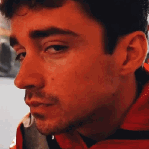 Man in Red Jacket Looking