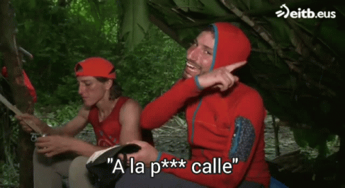 Man in Red Jacket Saying a la p ** calle