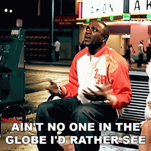 Man In Red Jacket Sitting GIF