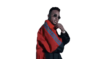 Man in Red Jacket Surrounded by Floating Red Balls