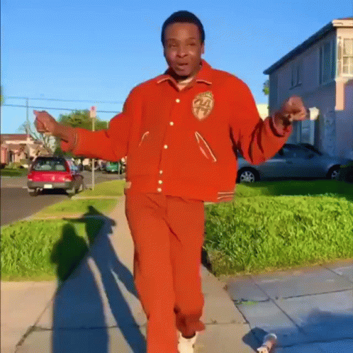 Man In Red Jacket With Letter A GIF