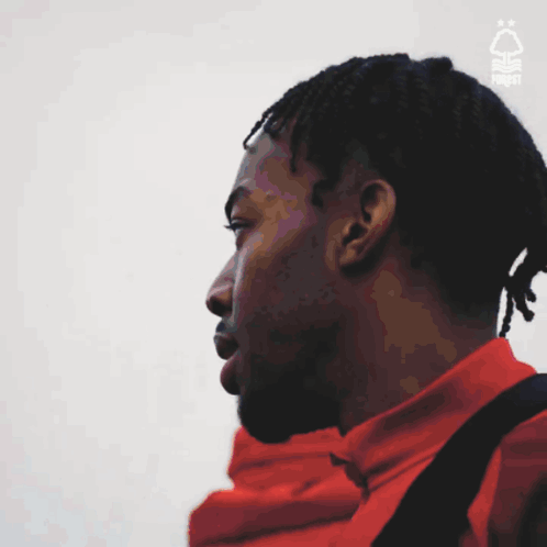 Man In Red Jacket With Logo GIF