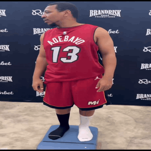 Man in Red Jersey Number 13