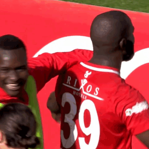 Man in Red Jersey Number 39