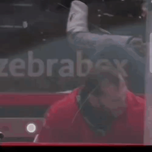 Man in Red Jersey Number 9