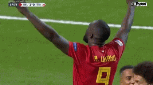 Man in Red Jersey Number 9