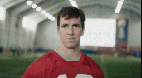 Man in Red Jersey with Number 12