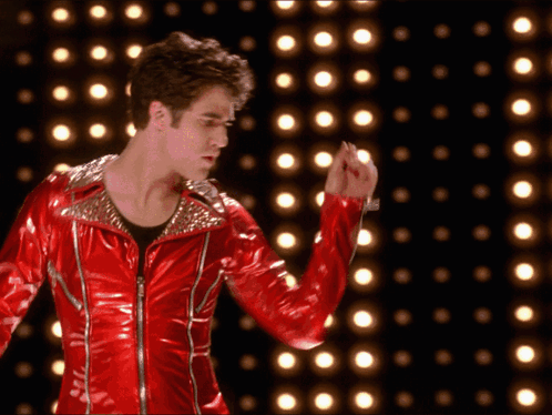 Man in Red Leather Jacket Dancing