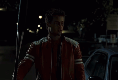 Man in Red Leather Jacket Holding Soda