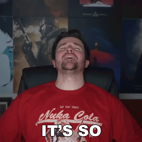 Man in Red Nuka Cola Shirt Laughing
