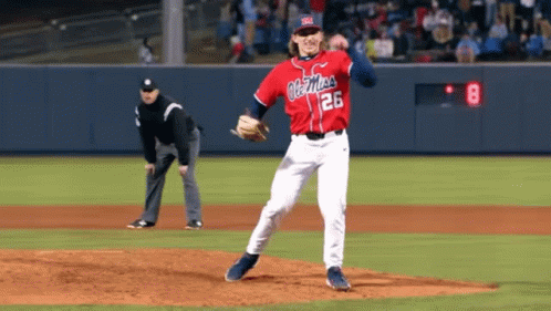 Man in Red Ole Miss Baseball Jersey in Front of Crowd