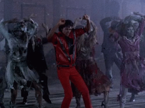 Man in Red Pants Dancing With Zombies