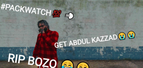 Man In Red Plaid Shirt By Brick Wall GIF