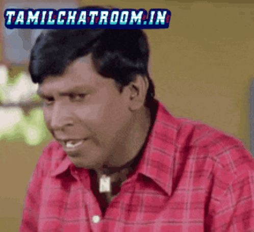 Man in Red Plaid Shirt Smiling with Tamilchatroom.In Logo