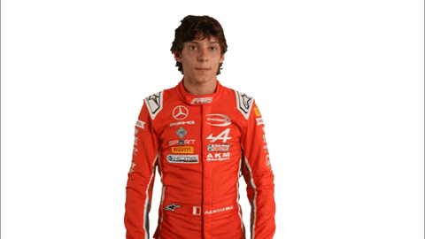 Man in Red Racing Suit with AKM