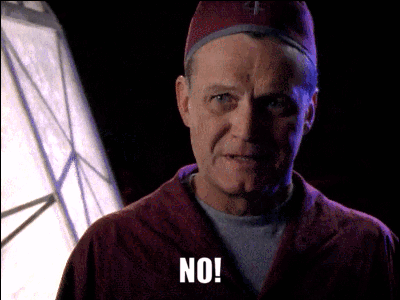 Man In Red Robe And Hat Saying No GIF