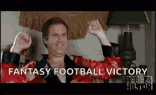 Man in Red Robe Celebrating Fantasy Football Victory