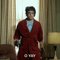 Man In Red Robe Holding Glasses GIF