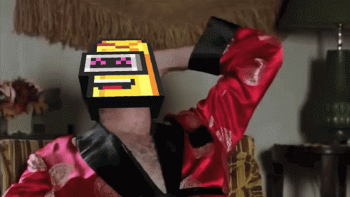 Man in Red Robe With Pixelated Cube Saying I