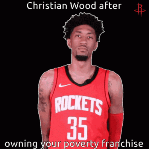 Man in Red Rockets Jersey Giving Thumbs Up