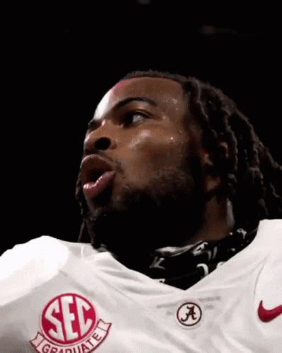 Man in Red SEC Jersey With Falling Confetti