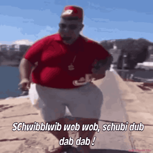 Man in Red Shirt and White Shorts Saying Schwibblwib
