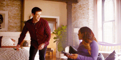 Man in Red Shirt and Woman in Purple Sweater