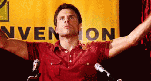 Man in Red Shirt at Microphones