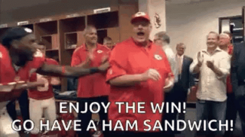 Man in Red Shirt Dancing in Locker Room