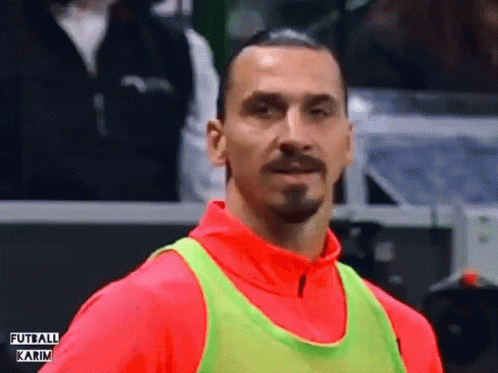 Man In Red Shirt Green Vest Futball Karim GIF