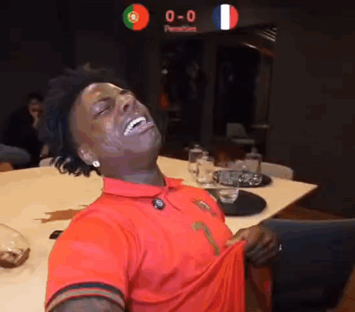 Man In Red Shirt Laughing GIF