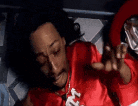 Man In Red Shirt Laying On Bed GIF