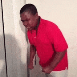 Man In Red Shirt Making Funny Face GIF